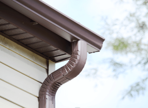 Gutter connecting to downspout