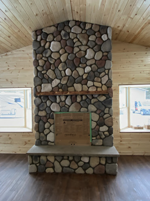 stone fireplace in newly built building